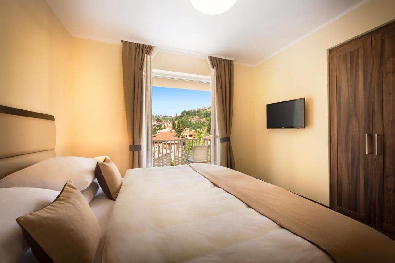 Remisens Casa Rosa - Hotel Metropol Annexe Portorož Oda fotoğraf